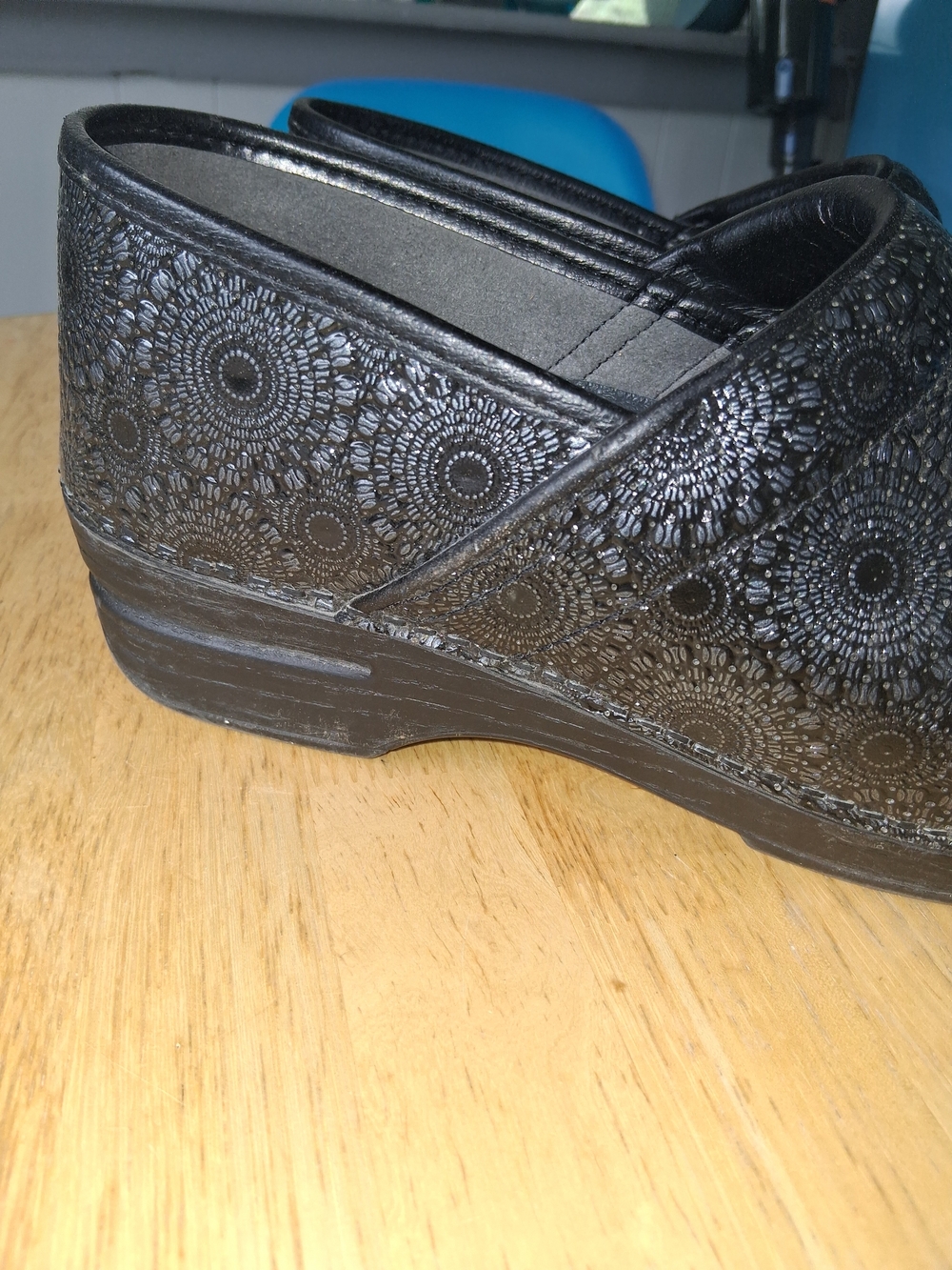 Dansko Black Textured Floral-Pattern Clogs - Picture 2 of 3